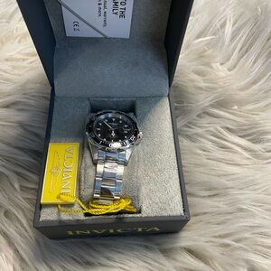 Invicta Men's Silver Watch black dial brand new never worn (was a gift).